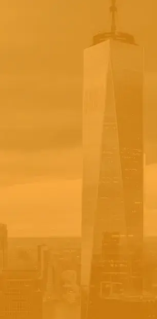 Skyscraper tower rising above city skyline